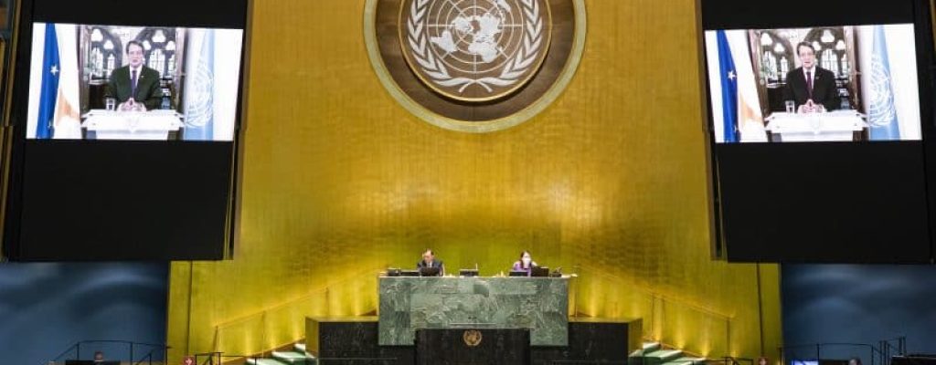 Cyprus says committed to reunification talks, but not at gunpoint