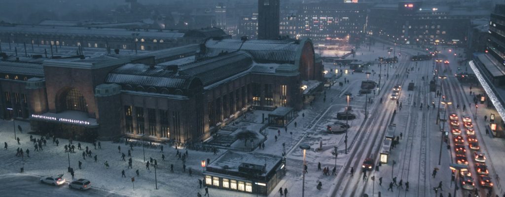 aerial photography of street at night covered with snow