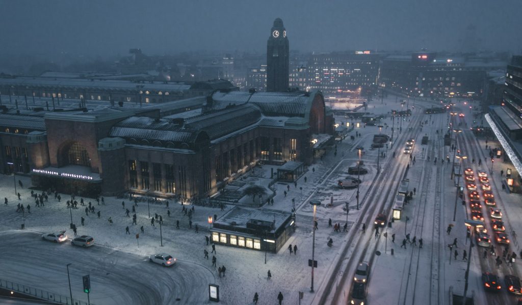 aerial photography of street at night covered with snow