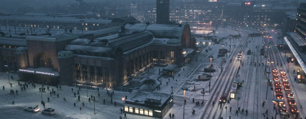 aerial photography of street at night covered with snow